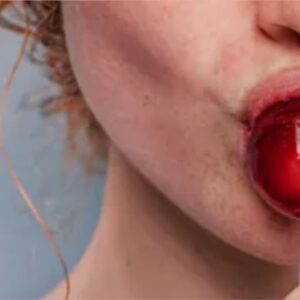 Women sucking lolipop