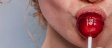 Women sucking lolipop