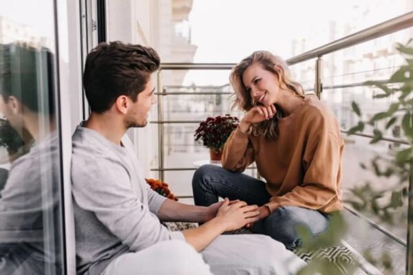 couple sitting in balcony