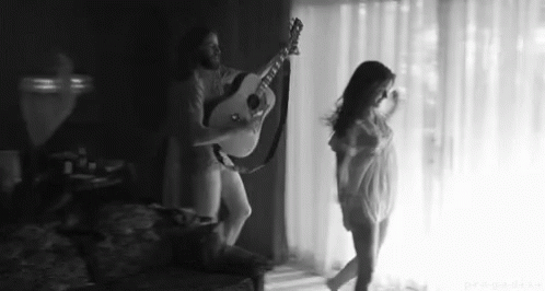 guy play guitar for her girlfriend