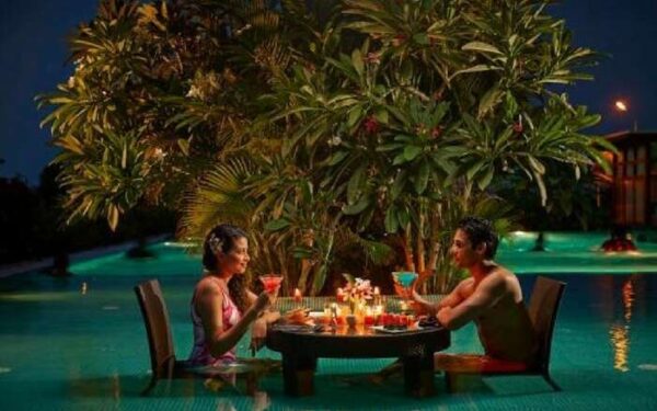 Couple seating in the pool